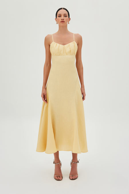 VESTIDO MIDI COM DRAPEADOS BUSTO E BARRA AMPLA AMARELO MANTEIGA