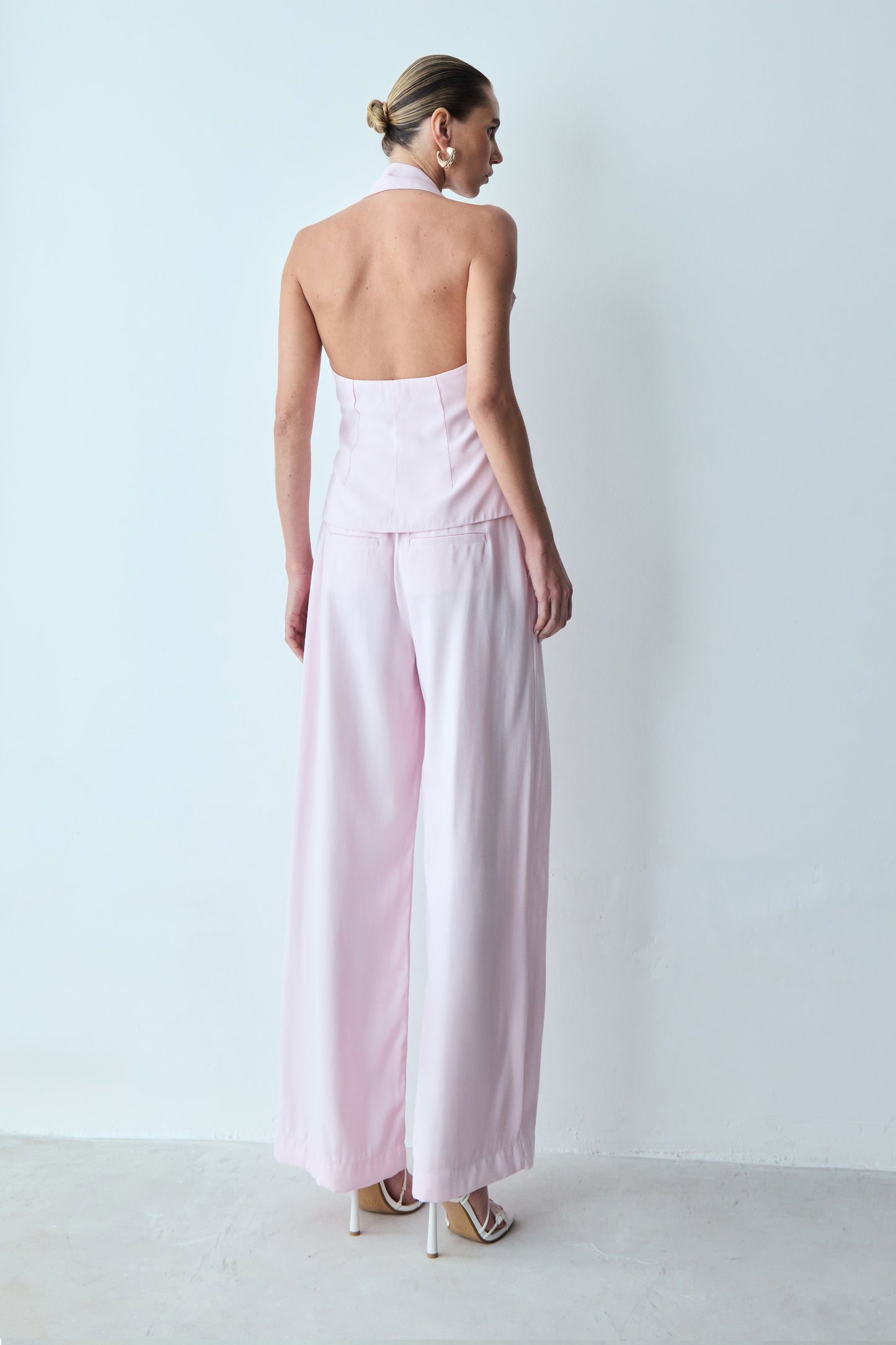 CALCA RETA COM ELASTICO NA CINTURA E BOLSO COSTAS ROSA BEBE