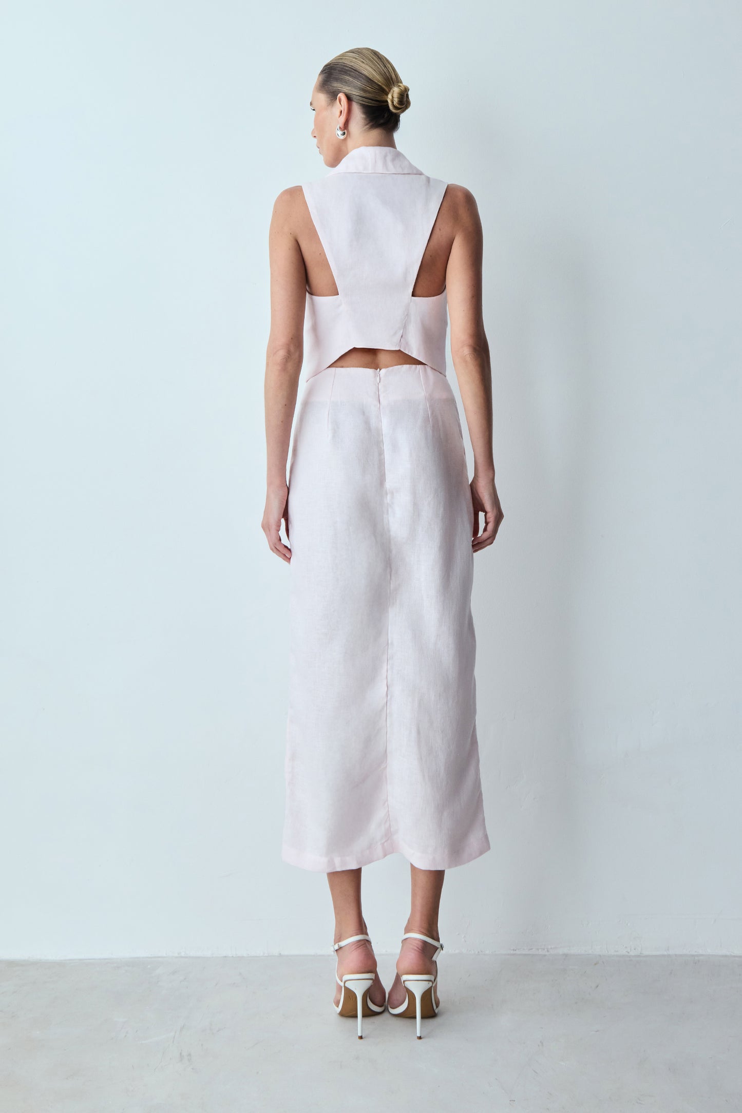 SAIA MIDI COM BOTAO FENDA E BOLSO FRONTAL ROSA CELESTIAL