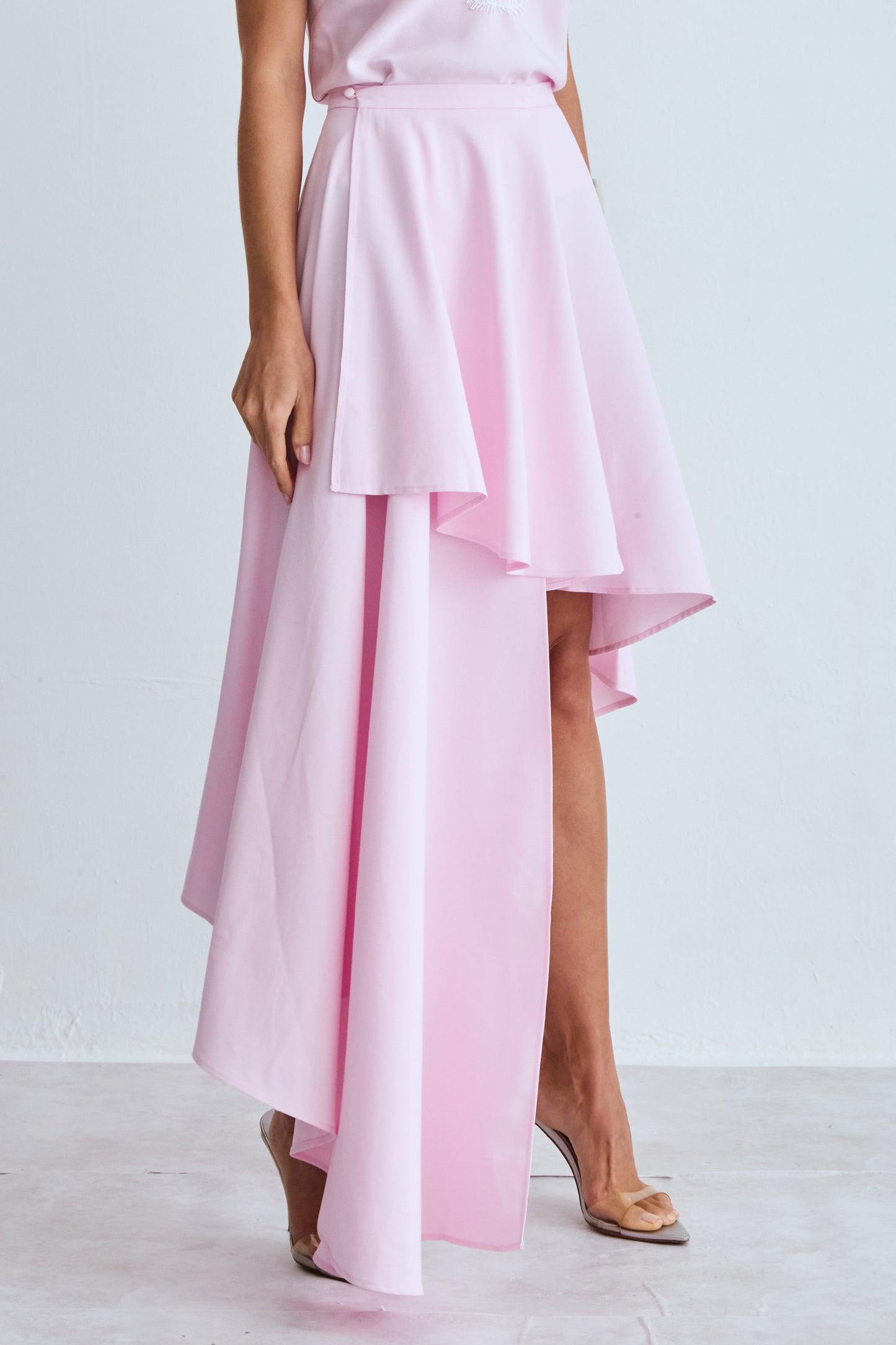 SAIA MIDI BARRA ASSIMETRICA E LATERAL CALDA LONGA ROSA BEBE