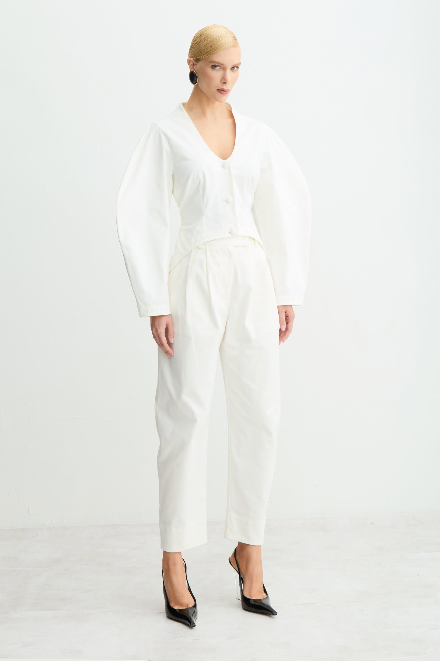 BLUSA MANGA LONGA MANGAS E BARRA ARREDONDADAS OFF WHITE