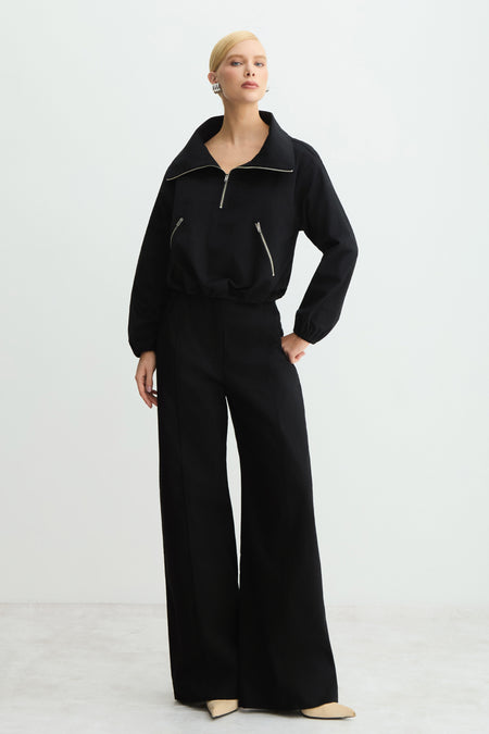 CALCA PANTALONA COSTURA PESPONTADA BOLSO AMPLO COSTAS PRETO
