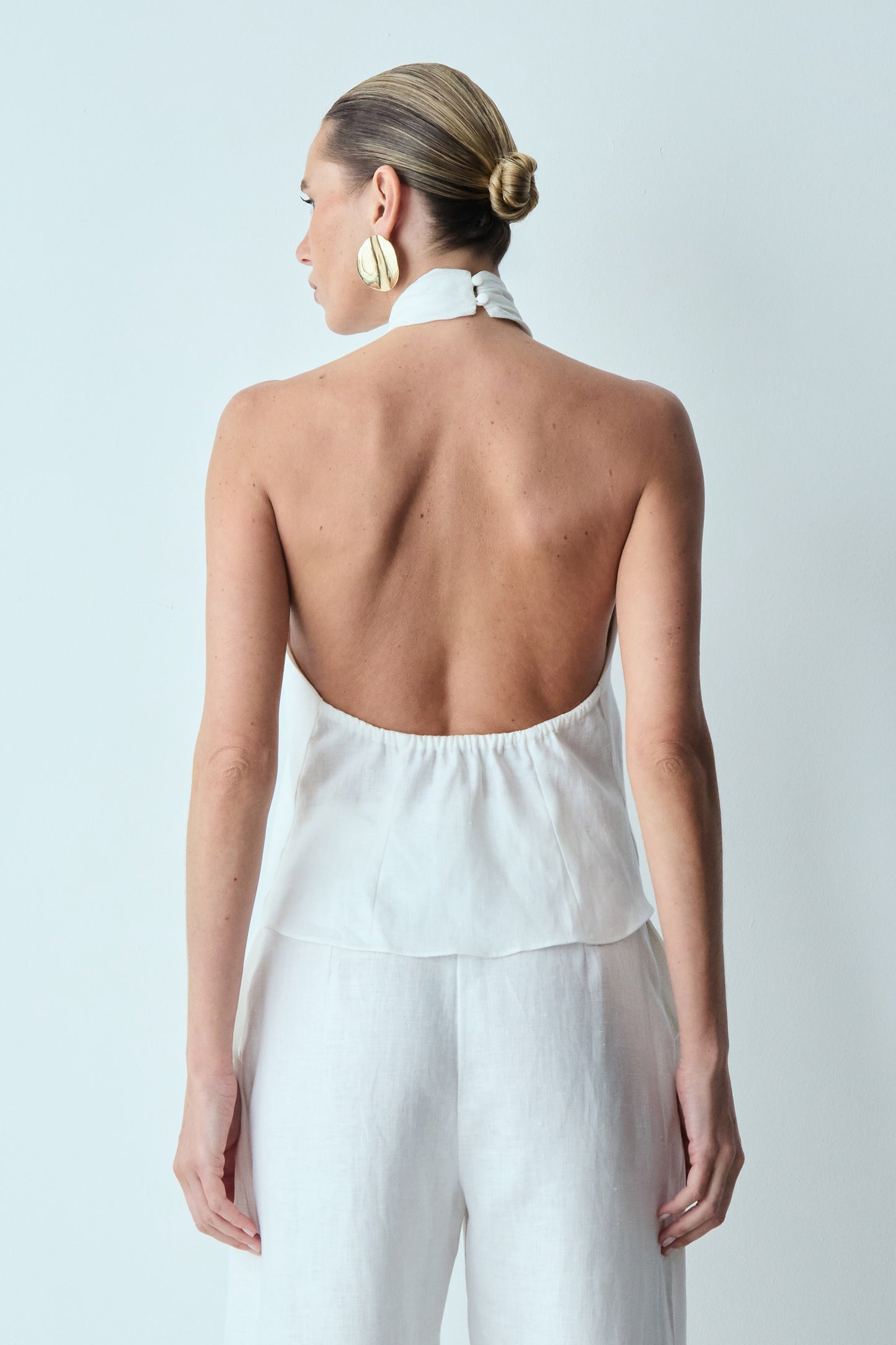 BLUSA TORÇÃO HALTER EM LINHO BRANCO