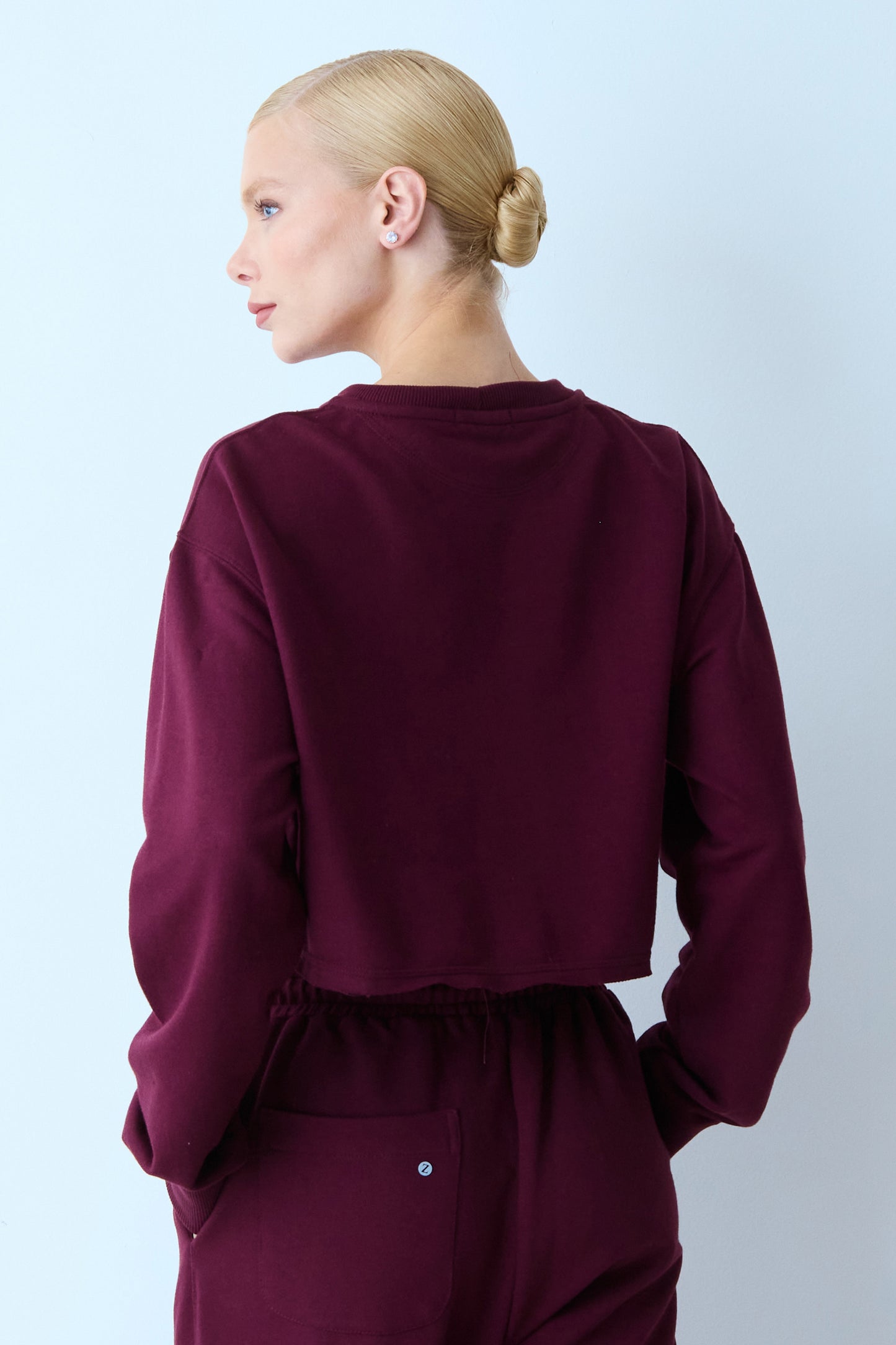 BLUSA MANGA LONGA MOLETOM GOLA CARECA BARRA DESCONSTRUIDA VINHO