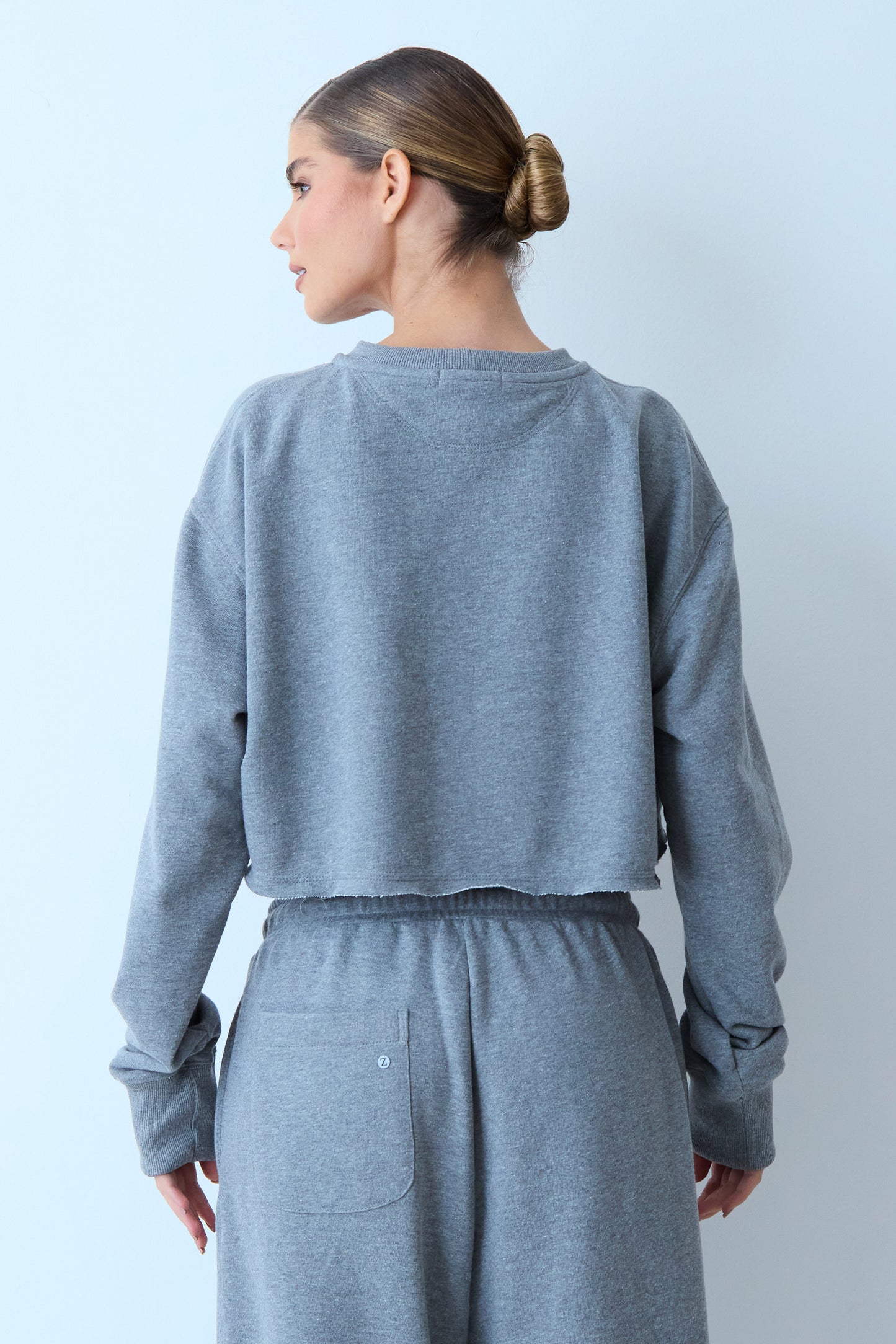 BLUSA MANGA LONGA MOLETOM GOLA CARECA BARRA DESCONSTRUIDA MESCLA