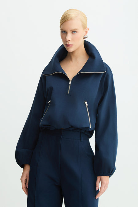 BLUSA MANGA LONGA ESTRUTURADA COM ZIPERES DE METAL E GOLA AZUL MARINHO